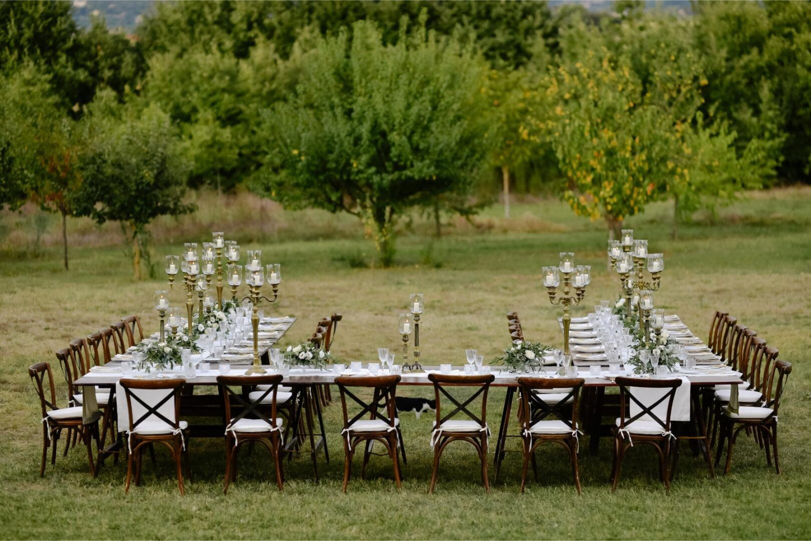 Long outdoor dining table with candelabras